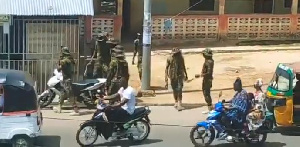 Some of the soldiers who were captures brutalising the residents of Wa