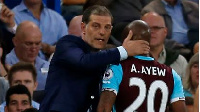 Andre Ayew (R) is consoled by West Ham United's Croatian manager Slaven Bilic