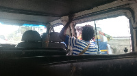 Agnes helps her brother as a trotro mate