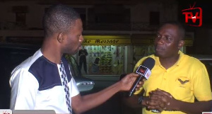 Counselor Lutterodt [in yellow] speaking to Kofi Adoma