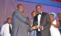 Mr. James Eric Antwi, the CEO of Starbow receiving the award