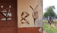 A photo of a defaced house