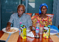 Mr John Asakinaba and Mrs Faustina Asakinaba enjoying their meal