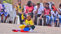 A pupil of Dade Nursery School in Luzira, participates in sports activity at the school