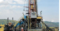 An oil rig drilling oil in western Uganda near the shores of L. Albert. FILE PHOTO