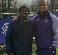 CK Akonnor with Anderlecht defender Vincent Kompany