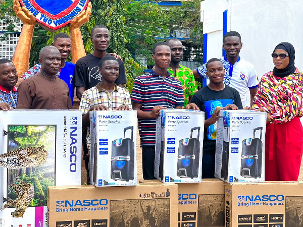 Electroland Ghana Limited officials with winners during the presentation