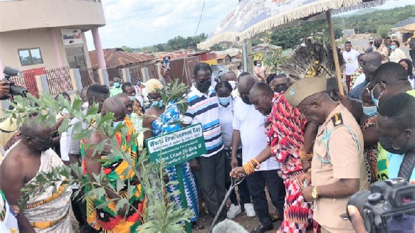 Nana Otuo Siriboe II, Juabenhene performing a ceremonial tree planting exercise