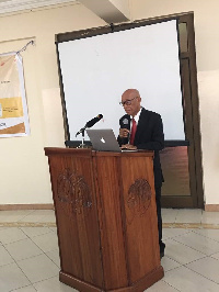 Justice Francis  Emile Short delivering his presentation at the 20th anniversary of ICC