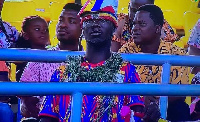 A dejected Hearts of Oak supporter