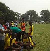 John Boye interacting with colleagues in training