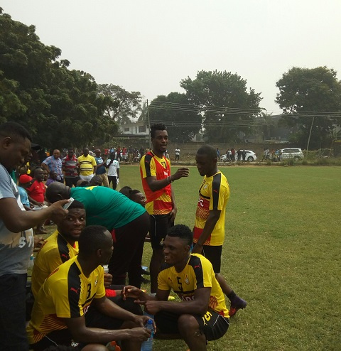 John Boye interacting with colleagues in training