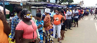 Voters queue to register their names