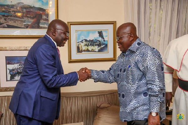 President Akufo-Addo exchanging pleasantries with his Veep Bawumia