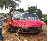 The damaged Sprinter bus at the accident scene