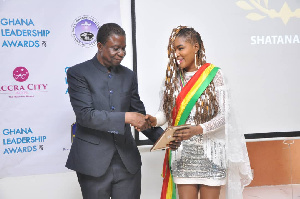 Shatana receiving her awards at the event