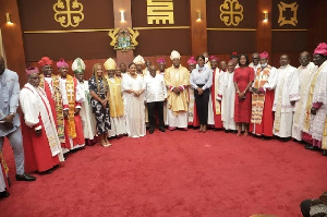 Ghanaian clergy with the president of the Republic of Ghana