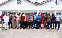 George Mireku Duker in a group photo with some managers and directors