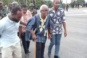 Leader of the Western Togoland group being assisted to walk