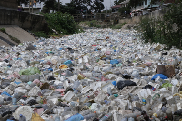 Fishermen in Osu, Accra, have resorted to burying plastic waste on the shores