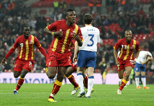 Gyan runs to celebrate the equaliser for Ghana