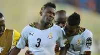 Asamoah Gyan in pain after defeat to Cameroon