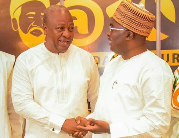 Former President Mahama shaking hands with Vice President, Dr Mahamudu Bawumia