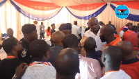 Security personnel trying to calm tempers at the NPP regional elections at Trade Fair