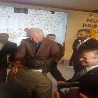 Dr. Owusu Afriyie Akoto greeting Bill Clinton