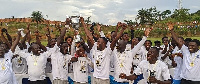 Players of Kotoku Royals celebrate after their coronation