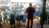 Mr Maxwell Kofi Asiedu addressing some of the studetns