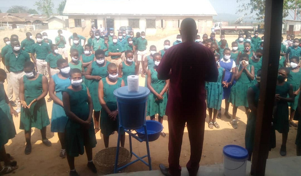 Mr Maxwell Kofi Asiedu addressing some of the studetns