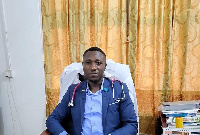 A medical doctor at the Bulenga Health Centre, Dr. Pascal Kingsley Mwin