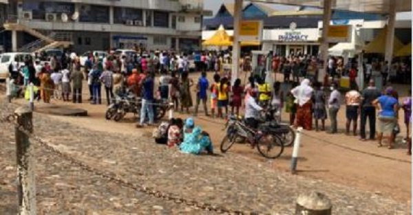 Citizens in long queues to register their SIM cards