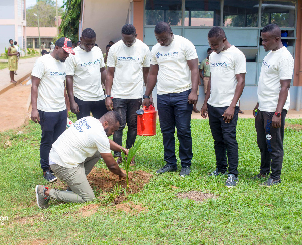 Some members of the foundation planting trees