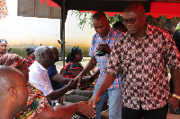 Paul Ansah greets the family on his arrival