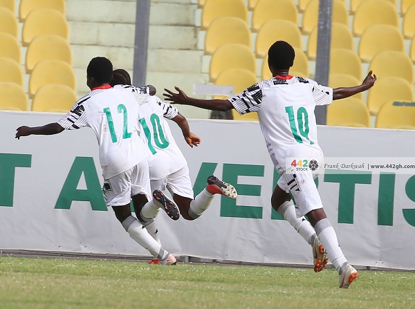 Black Maidens players celebrating their goal