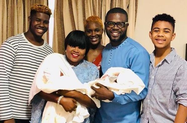 Funke Akindele and husband Rasheed Bello cuddling their twins