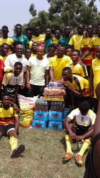 Andre with coach Yaw Preko and some of the players