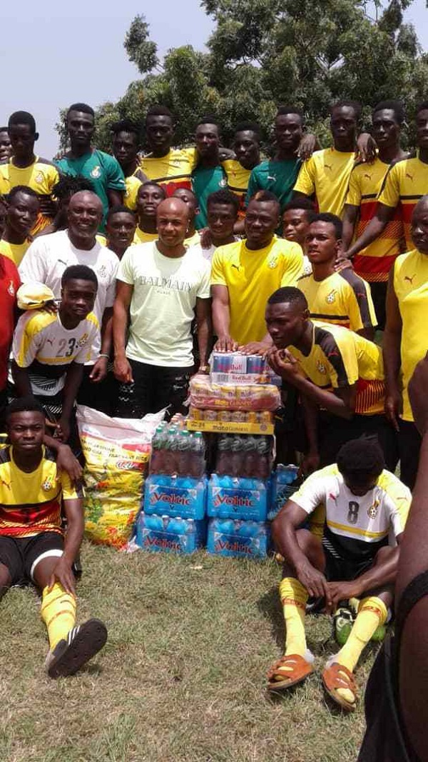 Andre with coach Yaw Preko and some of the players