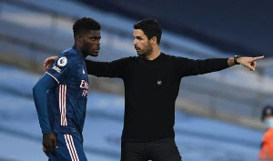 Thomas Partey with Mikel Arteta