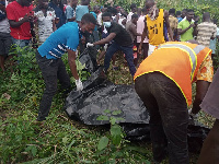 File photo of a corpse being conveyed in a bodybag