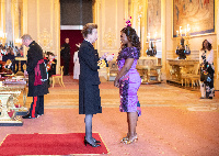 Lorraine Wright being decorated by HRH Princess Royal (Princess Anne)