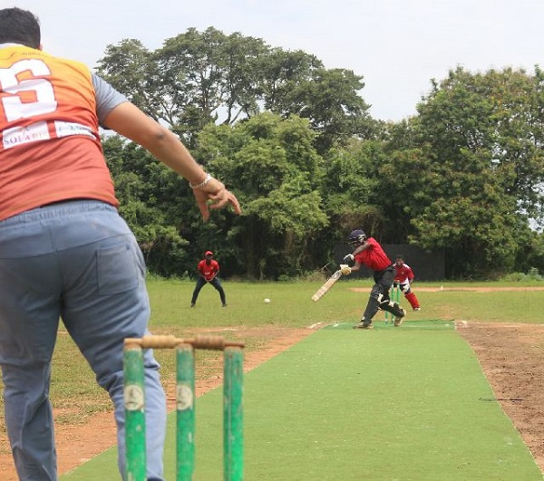 Ghana's cricket team practicing their tosses