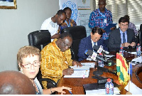 Trade Minister Alan Kyeyrematen pictured signing the agreement with UNIDO