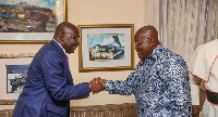 Dr. Mahamudu Bawumia (left) in a handshake with President Akufo-Addo