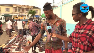 A trader from Tamale selling his wares