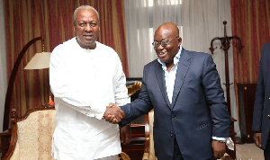 President Akufo-Addo in a handshake with John Mahama