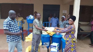 The MP hands over items for donation