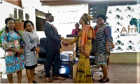 Dr. Zakariah (right) receiving the items from UNFPA Country Representative, Mr Ojuolape